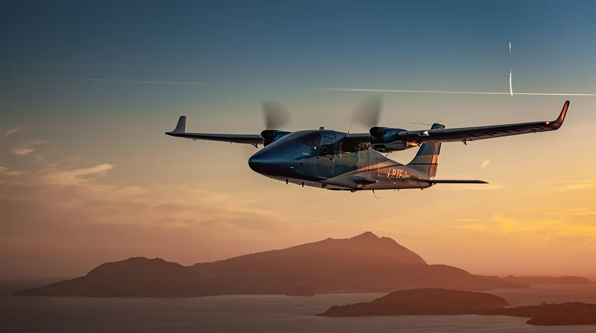 Tecnam P2006T twin-engine aircraft on tarmac - view 1