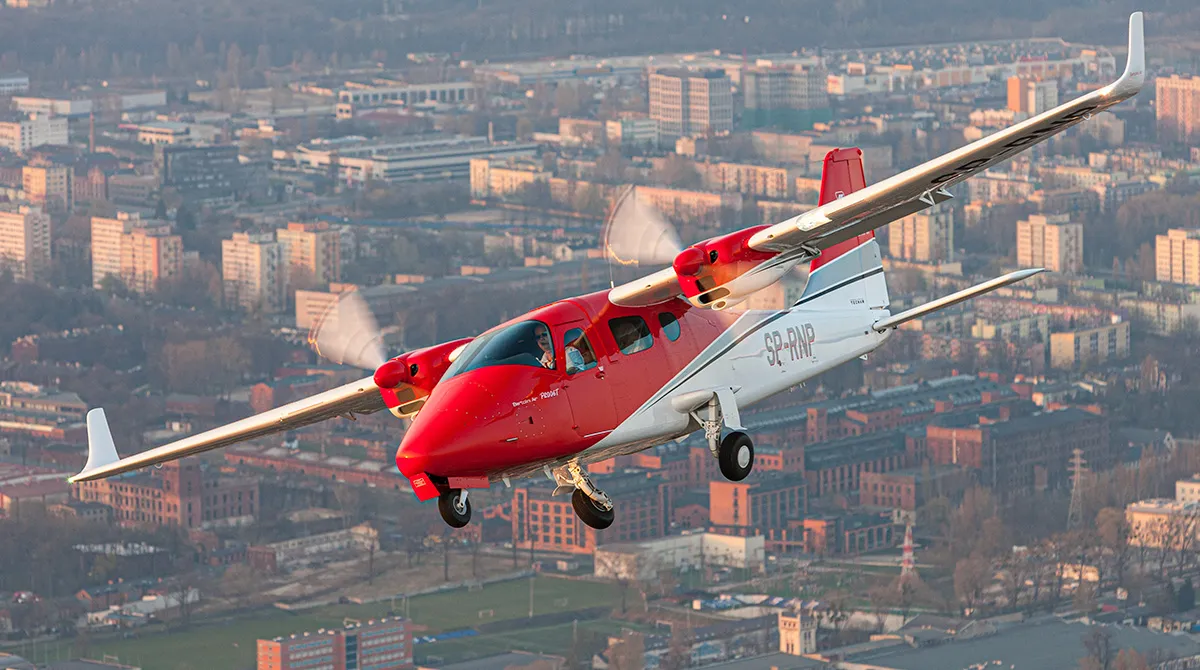 Tecnam P2006T twin-engine aircraft on tarmac - view 8